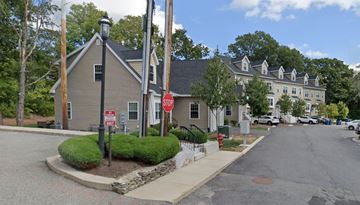 Canton apartment for rent - A stop sign is on a pole at a street corner.
