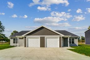 Elida apartment for rent - a house with a garage and a driveway