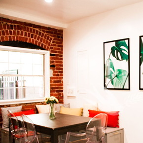 Los Angeles apartment for rent - a dining room with a table and chairs and pictures on the wall
