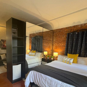 Los Angeles apartment for rent - a bedroom with two beds and a large mirror