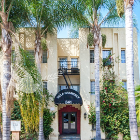 Los Angeles apartment for rent - a building with palm trees in front of it