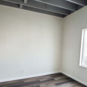 Los Angeles apartment for rent - A room with a window and wooden flooring.