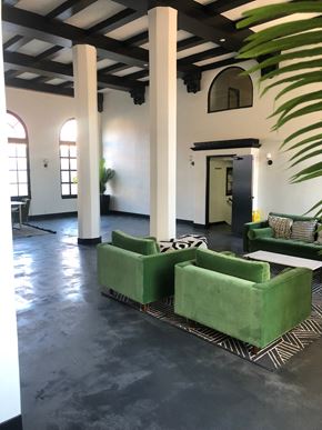 Los Angeles apartment for rent - A room with a white wall and a black door.