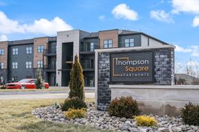 Jeffersonville apartment for rent - a building with a sign for the homestead square apartments
