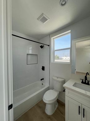 North Hollywood apartment for rent - a bathroom with a toilet and a tub and a sink