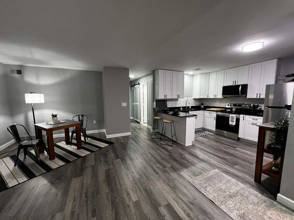 Trenton apartment for rent - A kitchen with a dining table and chairs.