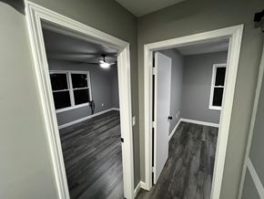 Trenton apartment for rent - A room with a white door and a window.