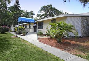 Titusville apartment for rent - A building with a blue awning that says Morningside Apts.