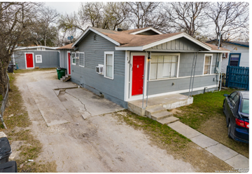 San Antonio apartment for rent - a blue house with a red door and a driveway