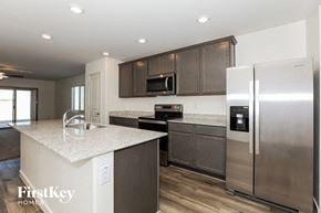 Florence house for rent - an updated kitchen with stainless steel appliances and granite counter tops