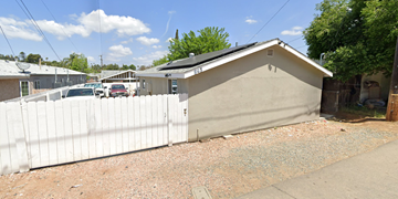 Escondido apartment for rent - A white fence in front of a house.