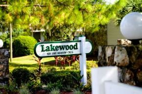 Brandon apartment for rent - A sign that says Lakewood is in front of a green hedge.