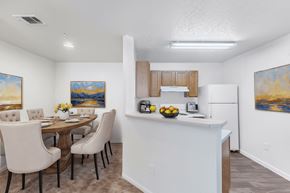 Port St Lucie apartment for rent - A dining room with a table set for four.