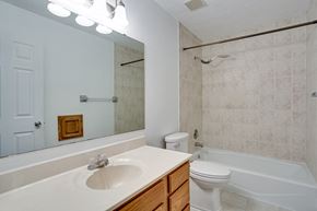 Eagan house for rent - a bathroom with a sink toilet and a shower