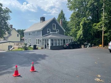 Burlington apartment for rent - a house with cones in a parking lot