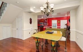 Washington house for rent - a kitchen and dining room with a yellow table