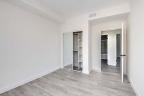 Van Nuys apartment for rent - a living room with white walls and a wood floor