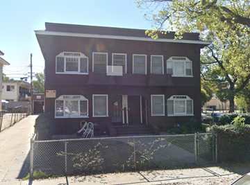 Los Angeles apartment for rent - a brown house with a fence in front of it