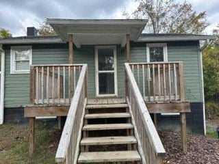 Mount Airy house for rent - A small house with a porch and stairs leading to the front door.