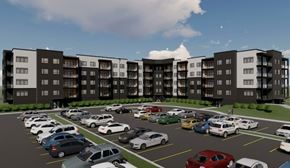 Lantz apartment for rent - A parking lot with cars and apartment buildings in the background.