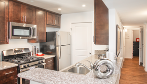 Moorpark apartment for rent - a kitchen with granite counter tops and stainless steel appliances