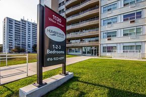 Toronto apartment for rent - A sign for 1130 Wilson Avenue Humber River with a phone number for bedrooms.