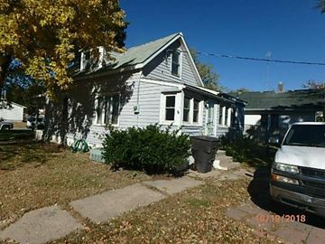 Grand Island house for rent - a house with a car parked in front of it