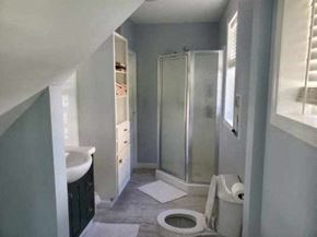 Elida house for rent - a bathroom with a shower and a toilet and a sink