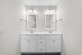 Aiken house for rent - the preserve at ballantyne commons community bathroom with dual sinks and mirrors