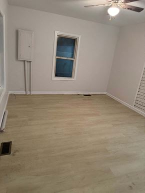 Bristol house for rent - a room with a hard wood floor and a window