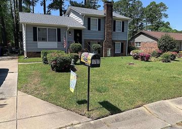 Fayetteville house for rent - a mailbox in the front yard of a house