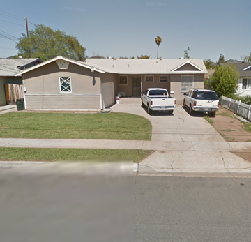 Escondido house for rent - a house with two cars parked in front of it