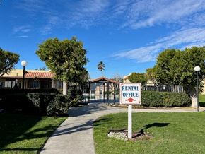 Fontana apartment for rent - A sign in front of a building that says Rental Office.