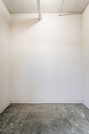 Nashville house for rent - an empty room with white walls and a cement floor