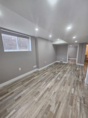 London apartment for rent - A room with wooden flooring and a window.