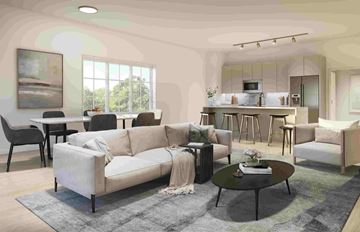 Greenwich apartment for rent - A modern living room with a grey sofa, a coffee table, and a dining table with chairs.