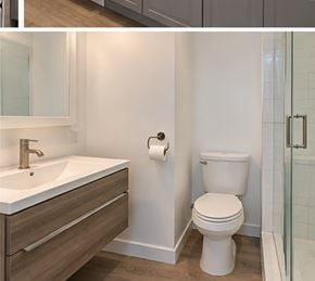 London apartment for rent - A white toilet sits next to a sink in a bathroom.