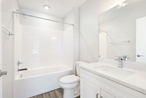 Desert Hot Springs house for rent - a bathroom with a sink toilet and a shower