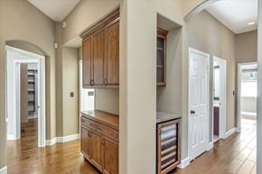 San Ramon house for rent - a laundry room with wooden cabinets and a door to a bathroom