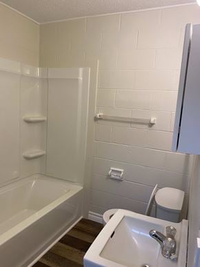 Wolfville apartment for rent - a small bathroom with a sink toilet and bath tub