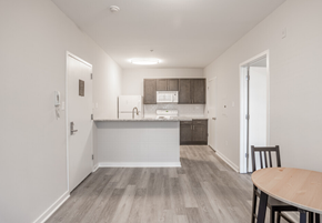 Philadelphia apartment for rent - A kitchen with a table and chairs in the foreground.