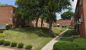 Baltimore apartment for rent - a park in front of a brick building