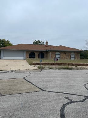 Killeen house for rent - a house on a street with a parking lot