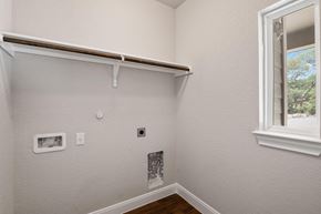 Spring Branch apartment for rent - the bedroom of a house with a window and white walls