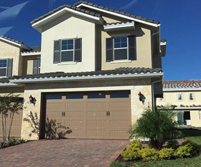 Orlando house for rent - a house with a garage door in front of it