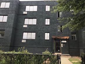 Washington apartment for rent - the exterior of a black brick building