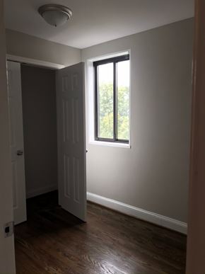 Washington apartment for rent - an empty room with a window and a door
