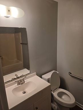Hattiesburg apartment for rent - A white sink and toilet in a bathroom.