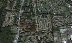 Manchester apartment for rent - A satellite image of a residential area with a red outline indicating a specific area of interest.