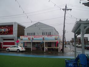 Salisbury apartment for rent - A car is parked in front of a building with a sign that says "Our Own Willey's".